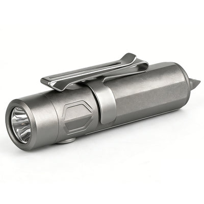 Titanium flashlight with a clip on a white background