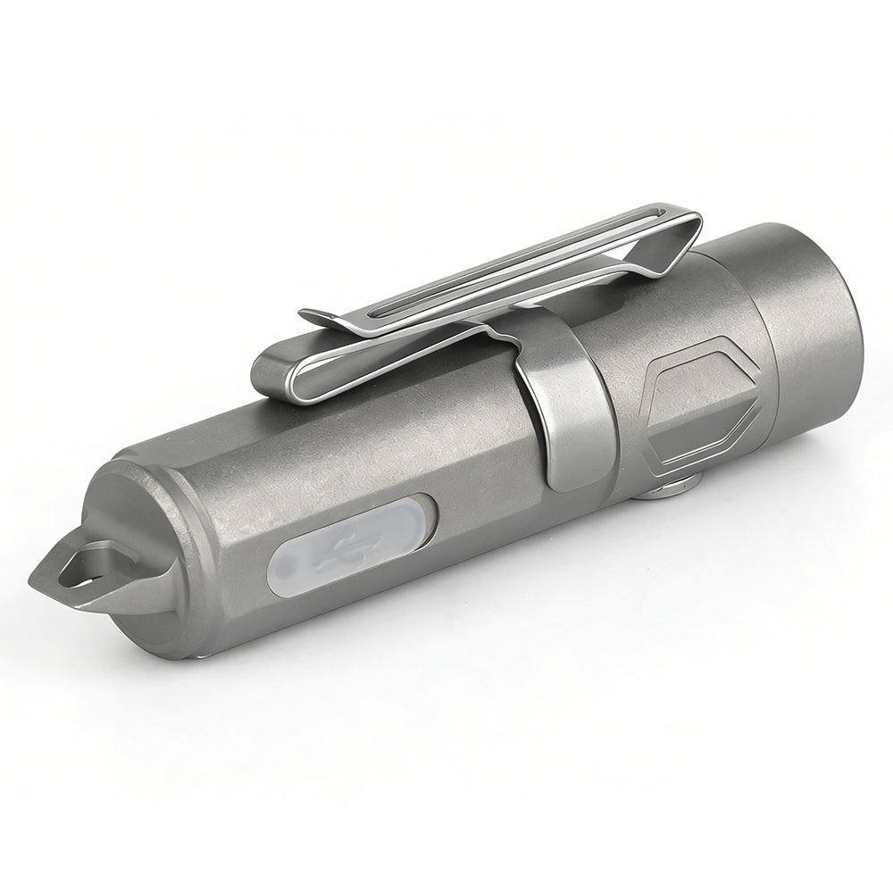 Titanium multi-tool with clip on a white background