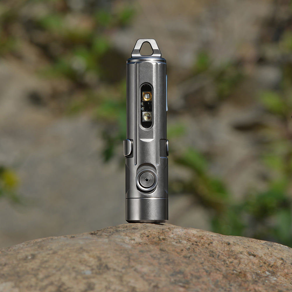 Small titanium torch on a rock with a natural background