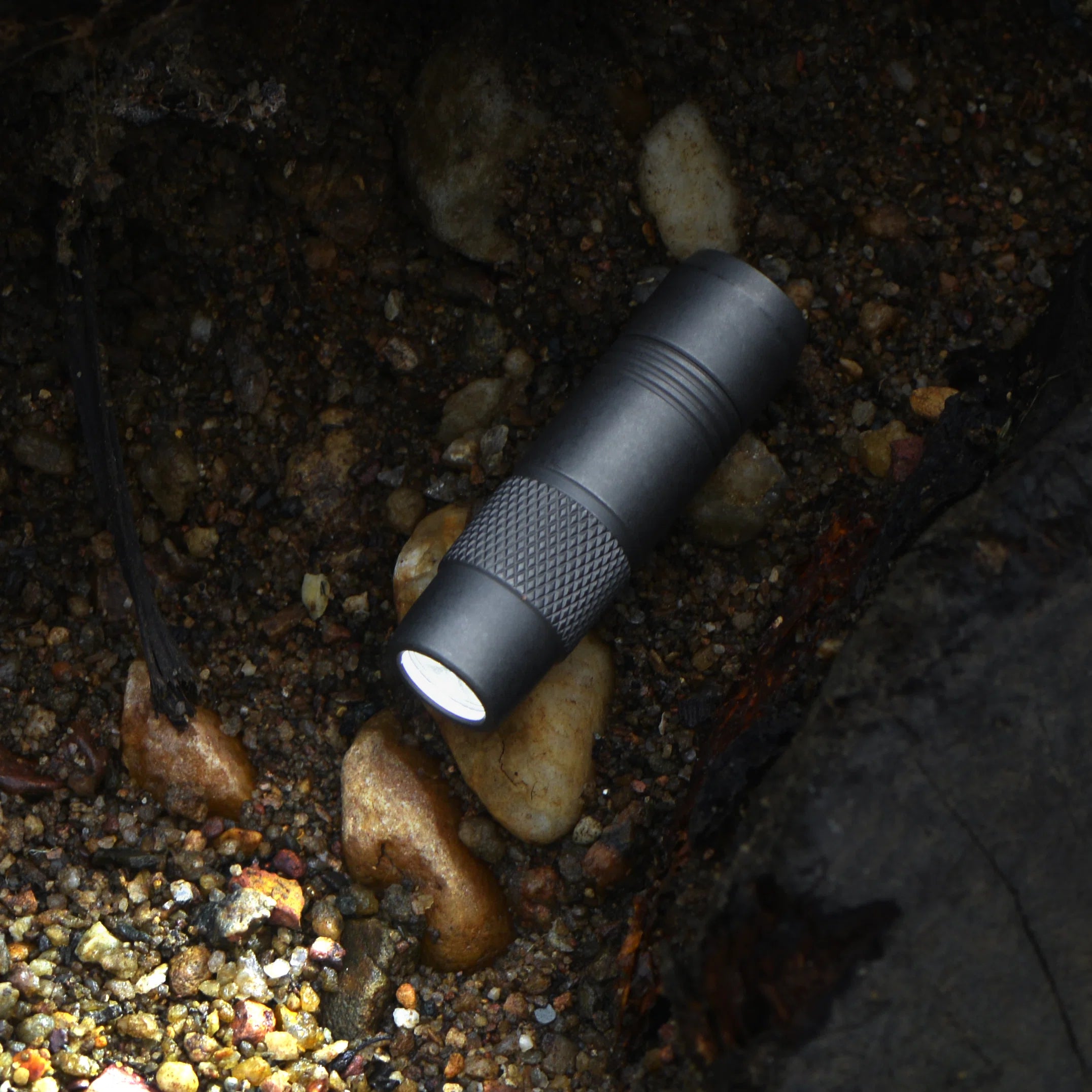 FIELDLUME T3 compact titanium flashlight shown for everyday carry
